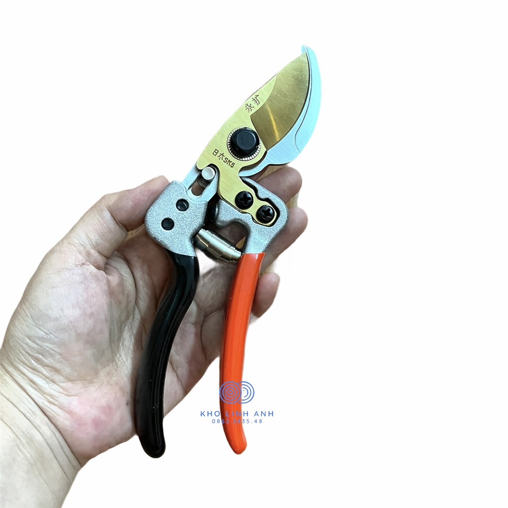 Kéo cắt cành cộng lực lưỡi thép SK5 Nhật Bản made in japan, lưỡi bầu, cán cam đen - KC0020