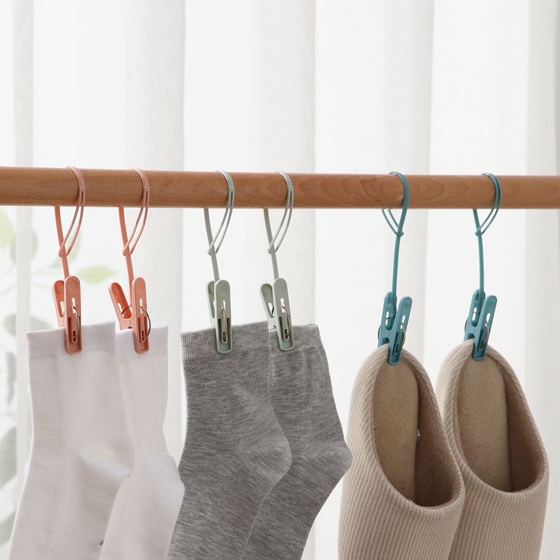 Móc Treo Quần Áo Bằng Nhựa Đa Năng Màu Sắc Ngẫu Nhiên Kèm Kẹp Tiện Dụng