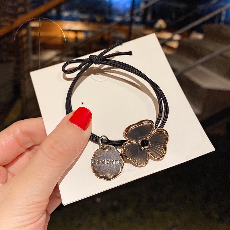 Dây buộc tóc co giãn mặt hình cỏ ba lá thời trang dành cho nữ