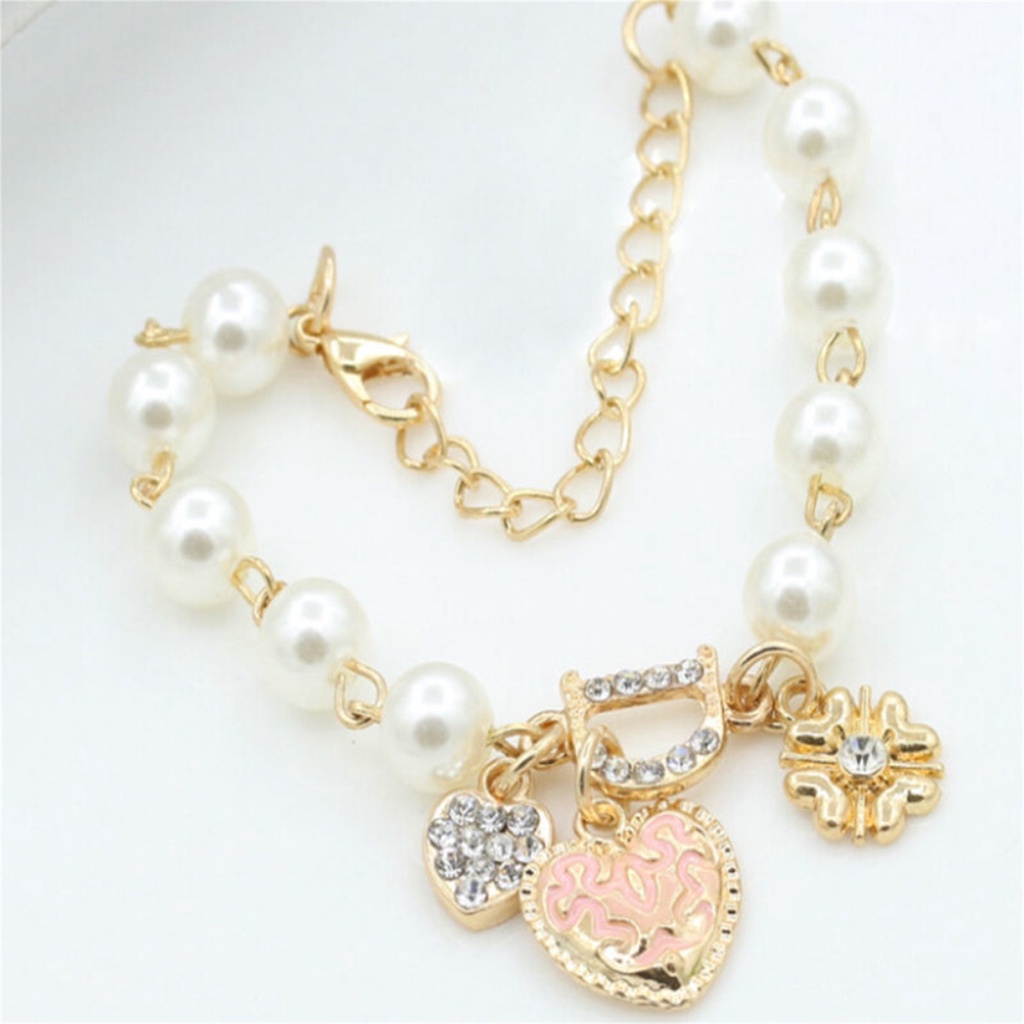 Lắc tay ngọc trai họa tiết trái tim xinh xắn cho nữ