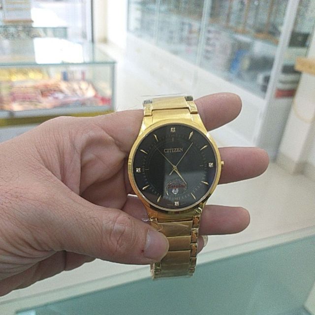 Đồng hồ Citizen Nam dây inox mạ vàng, mặt đen