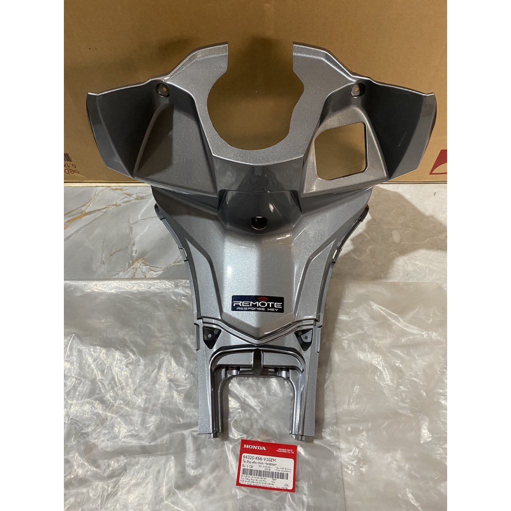 Ốp ống yếm chính - ốp ổ khóa HONDA AIR BLADE 125 năm 2015-2016 màu Xám bạc. *NHB56M* 64320K66V10ZM