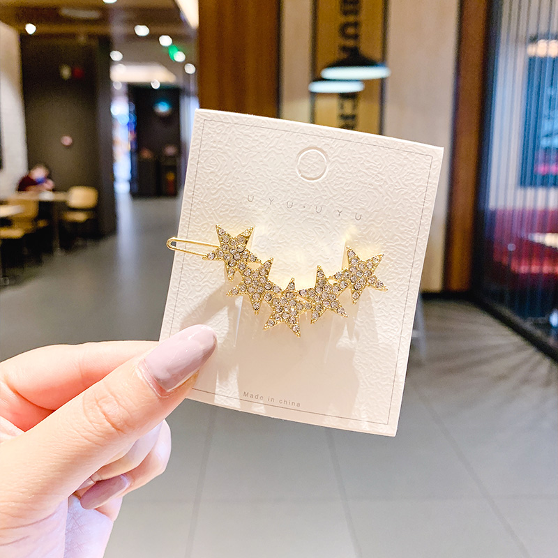 Kẹp tóc đính đá hình ngôi sao xinh xắn dành cho nữ