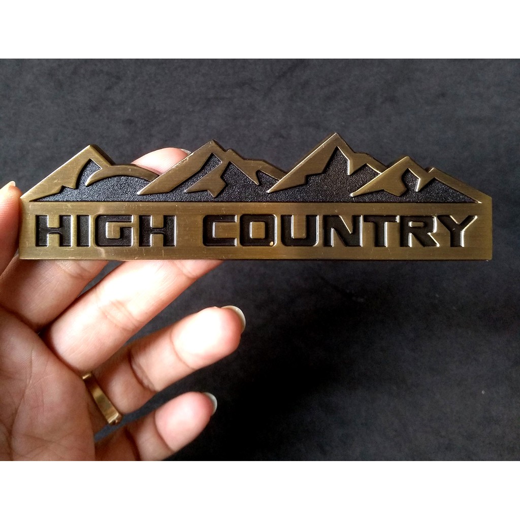 Logo kim loại chữ nổi HIGH COUNTRY dán ô tô