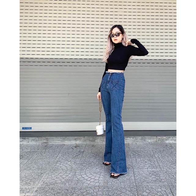 Quần loe cạp liền lai tua túi trước siêu sang