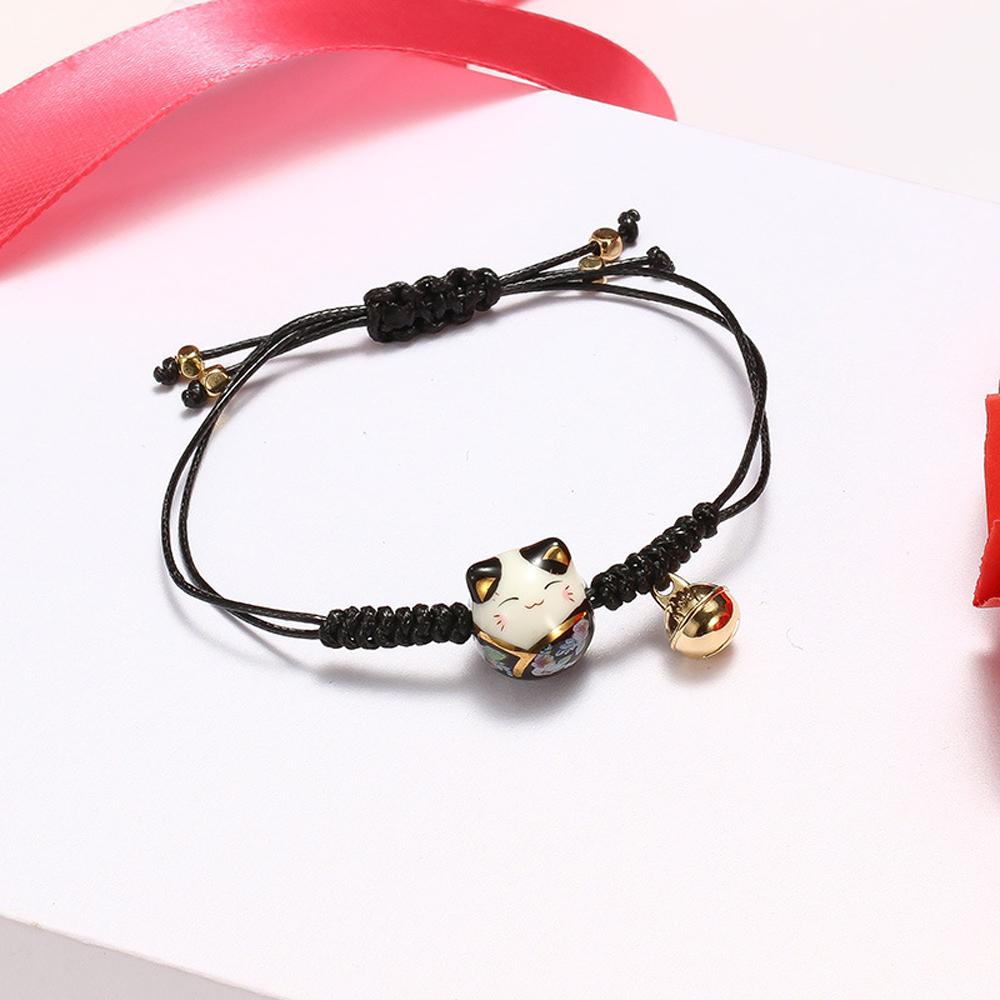 Vòng Tay Bện Dây Đỏ May Mắn Mặt Sứ Hình Chú Mèo Dễ Thương Cho Nữ