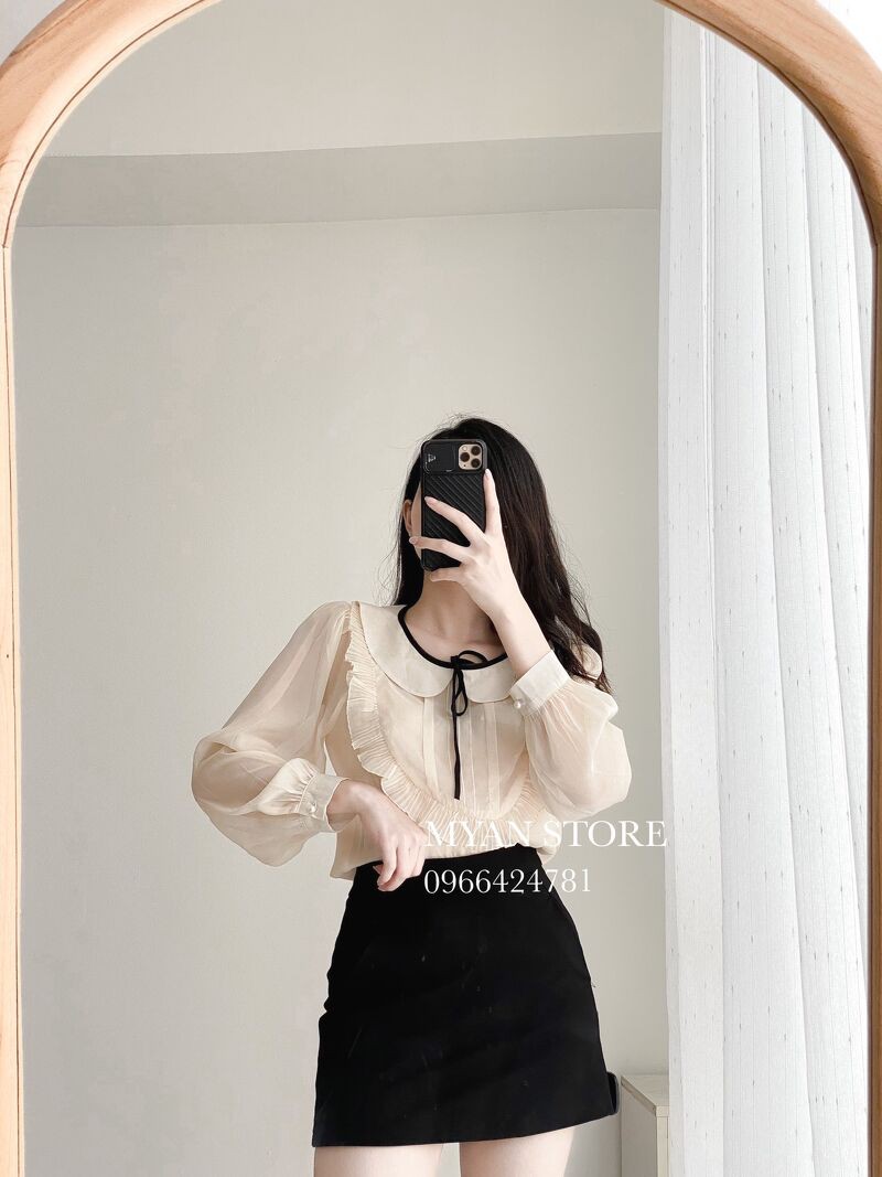 Sơ mi tơ nhũ cổ sen nơ đen, dập ly yếm ngực Avn032109