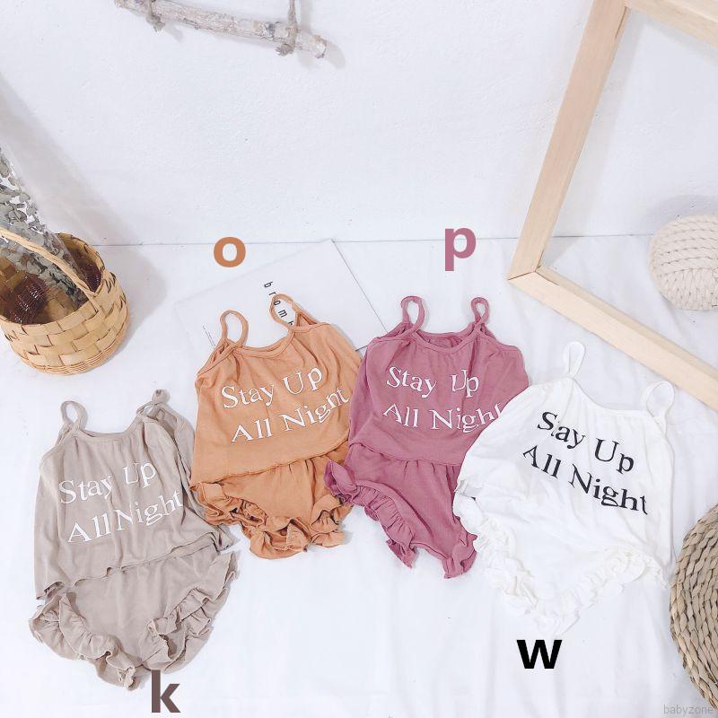 Set đồ gồm áo 2 dây in chữ kèm quần ngắn màu sắc dễ thương cho bé gái
