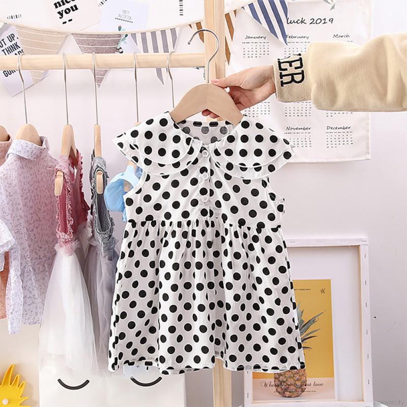 Đầm sát nách chấm bi cho bé gái