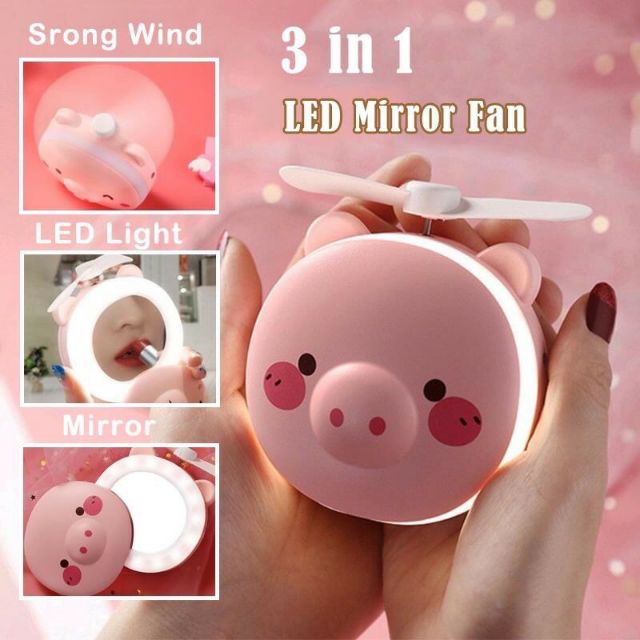 Quạt cầm tay mini hình con lợn có gương , đèn đa năng