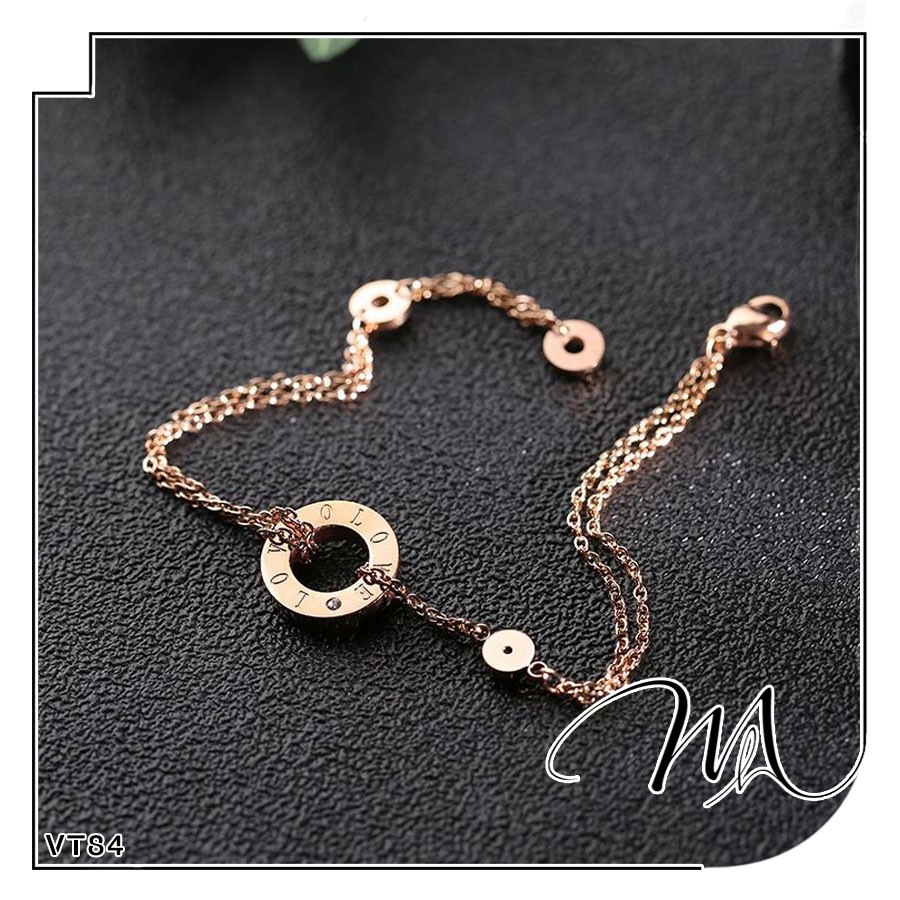 Lắc chân nữ Titan vòng tròn rỗng LOVE phối đá dễ thương - Măng’s House LC37