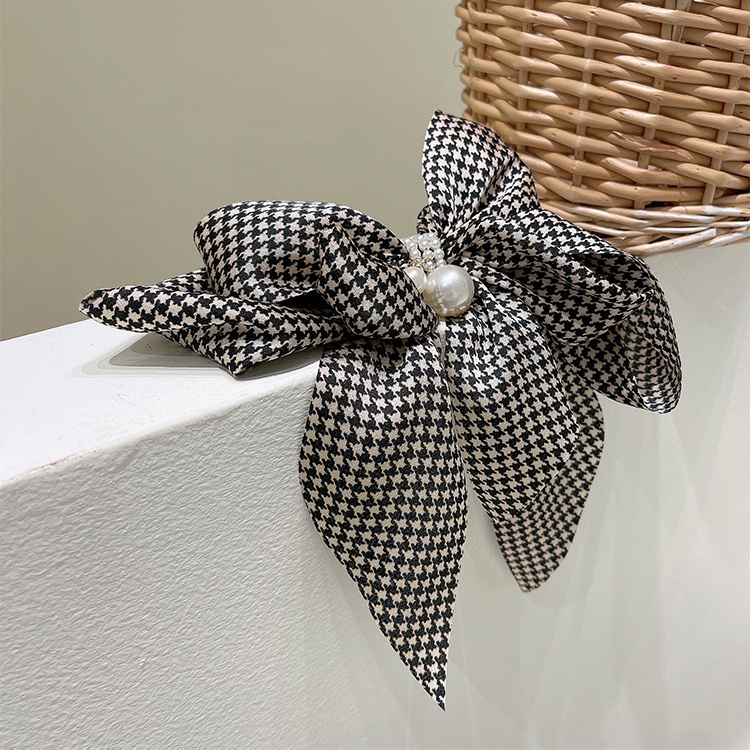 Kẹp tóc hình hơ đính ngọc trai giả xinh xắn cho nữ