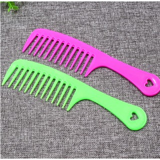 Lược nhựa răng thưa chải tóc