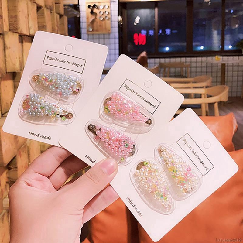 Kẹp tóc đính hạt giả ngọc trai cho bé