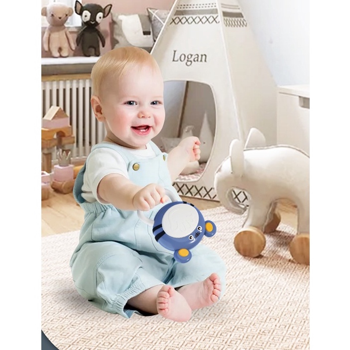 Trống Lúc Lắc Phát Nhạc Cầm Tay Hình Con Ếch Dễ Thương Luyện Tập Cầm Nắm Cho Trẻ Từ 0-1 Tuổi