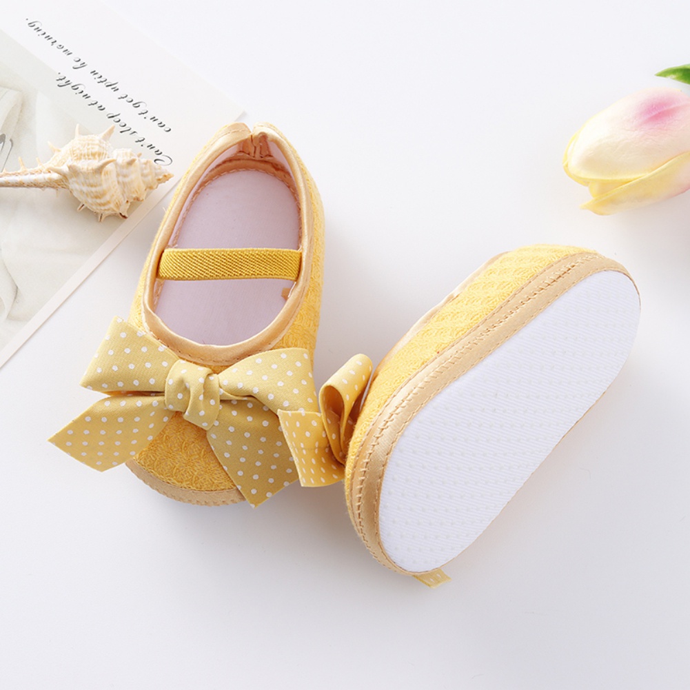 Set băng đô và giày tập đi đế mềm chống trượt đính nơ cho bé gái 0-18 tháng tuổi