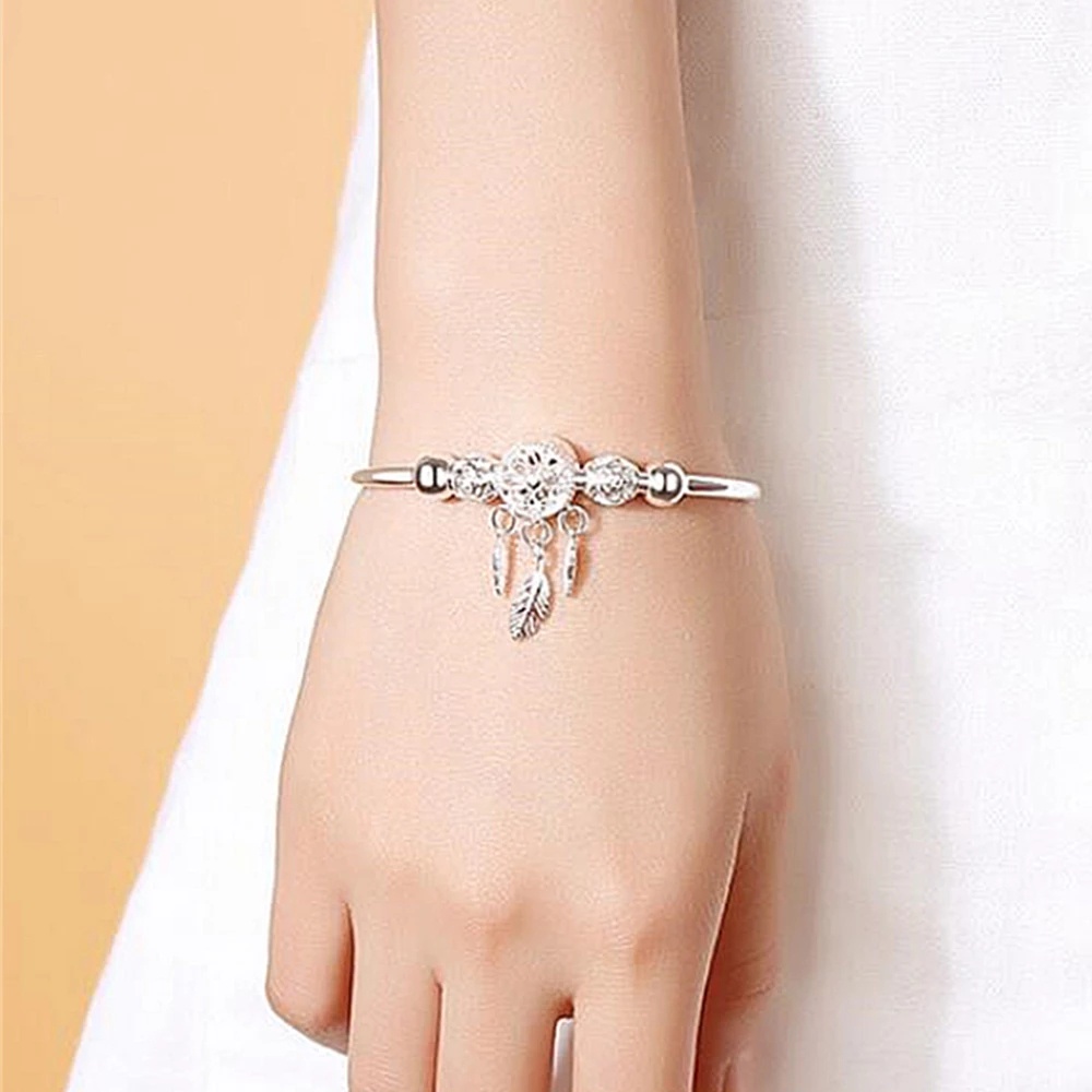 Vòng Đeo Tay Màu Bạc Hình Dreamcatcher Phối Lông Vũ Thời Trang Cho Nữ