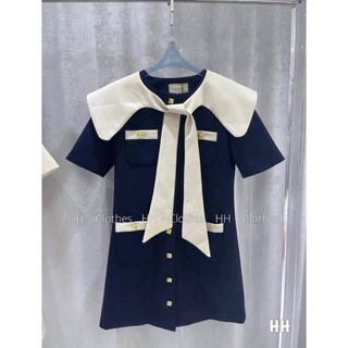 Váy nơ cổ viền khuy