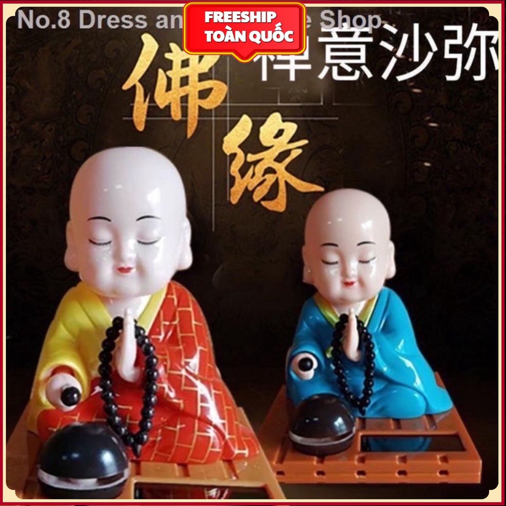 Tượng chú tiểu gõ mõ . .