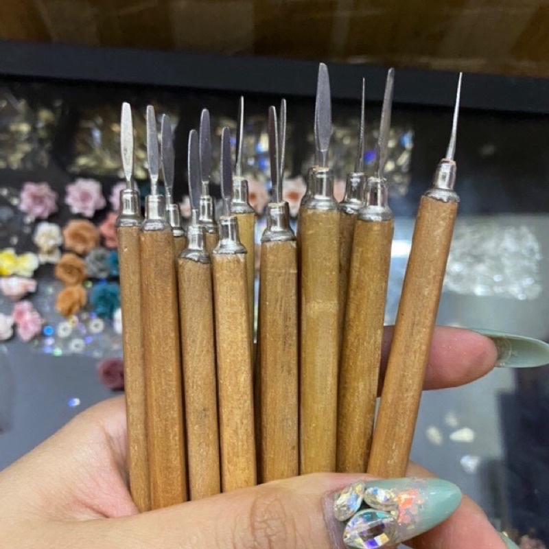 Lấy khoé cán gỗ nail
