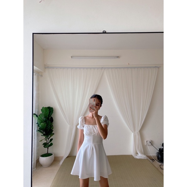 Đầm xòe TIEUDESIGN nhún nơ trước