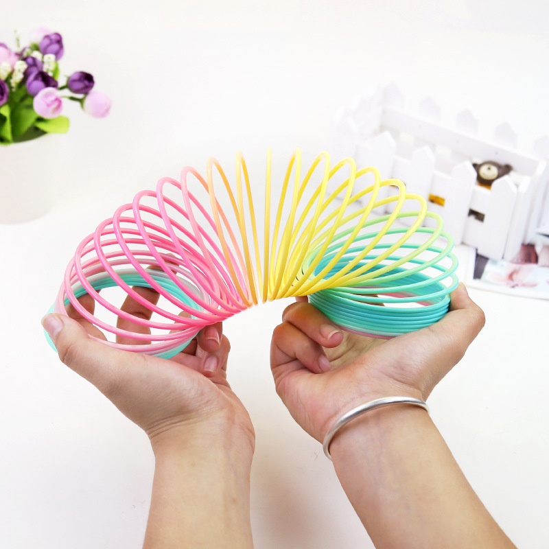 Lò xo cầu vồng cho bé, đồ chơi lò xo cầu vồng bảy sắc vui nhộn