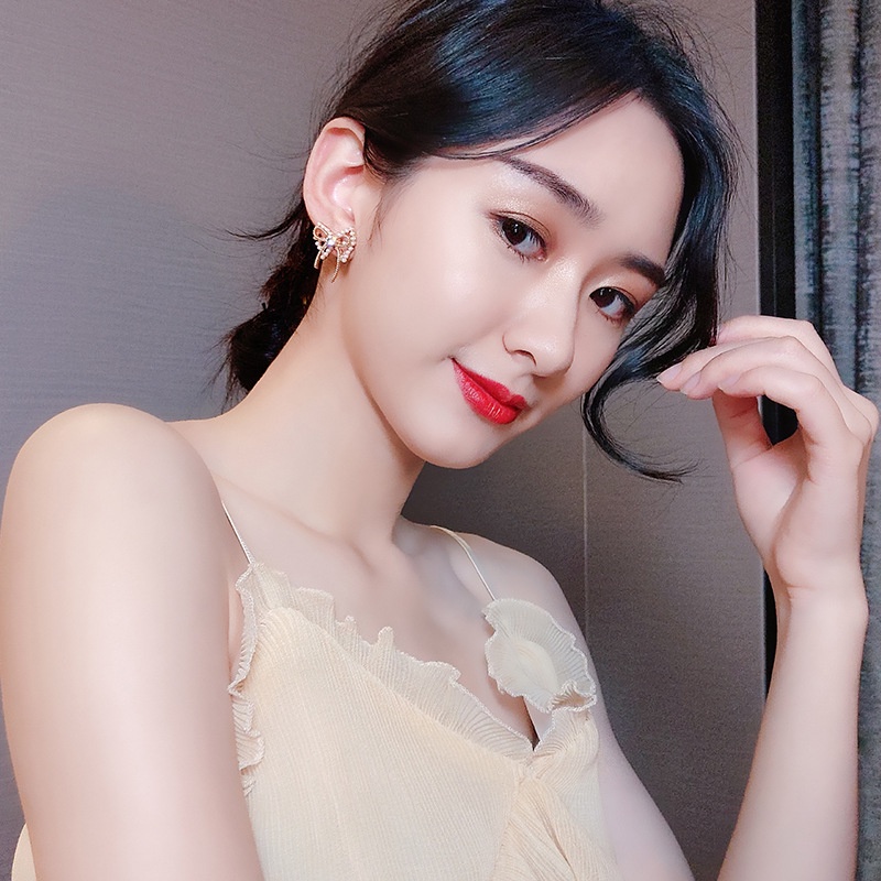 Đôi Khuyên Tai Hình Nơ Đính Ngọc Trai Thời Trang