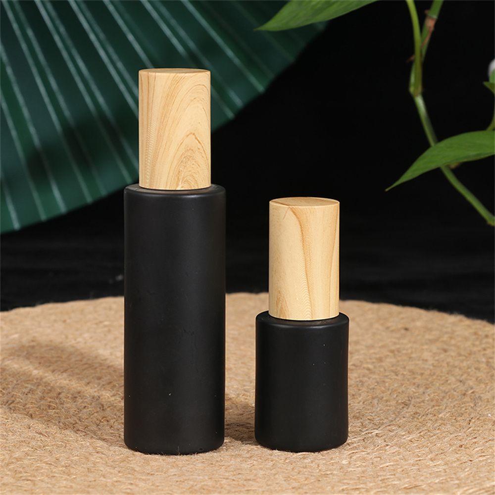 Chai Thủy Tinh Màu Đen Nắp Gỗ Có Thể Bơm Lại Tiện Dụng Mang Theo Du Lịch
