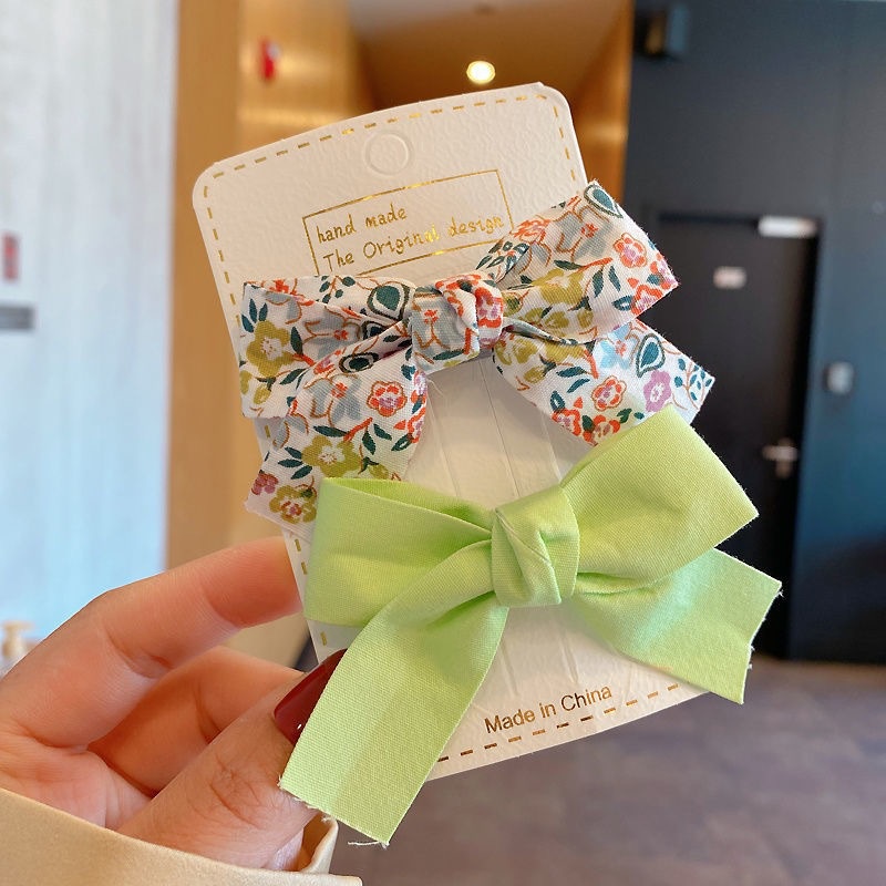 Kẹp tóc nơ AMILA họa tiết hoa xinh xắn dễ thương cho bé gái