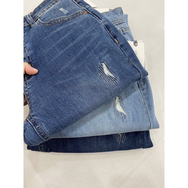 Quần jeans thiêu rách