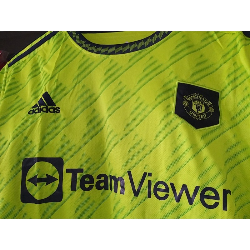 Quần áo bóng đá MU thái màu Xanh chuối bản fan - logo thêu