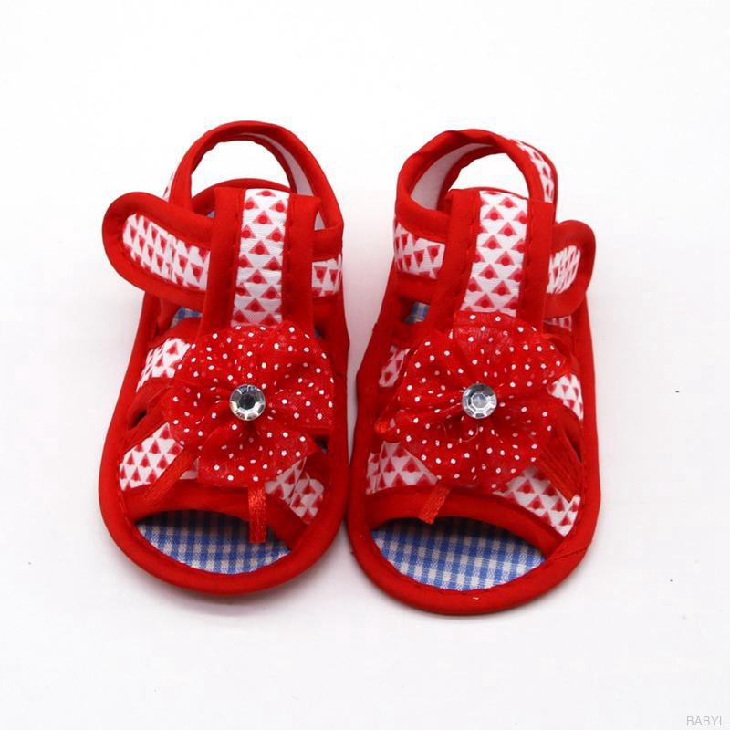 Giày sandals đế bằng thiết kế hoa xinh xắn chống trượt cho bé tập đi