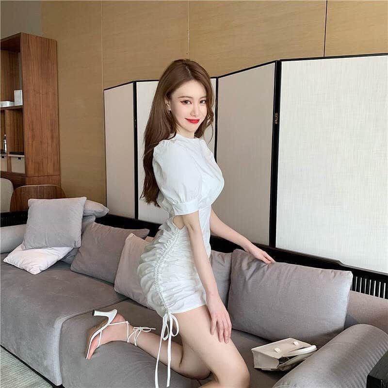 Đầm trắng rút hông cut out eo