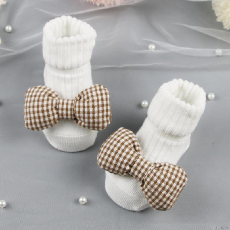 Đôi vớ cotton họa tiết caro đính nơ dễ thương dành cho bé