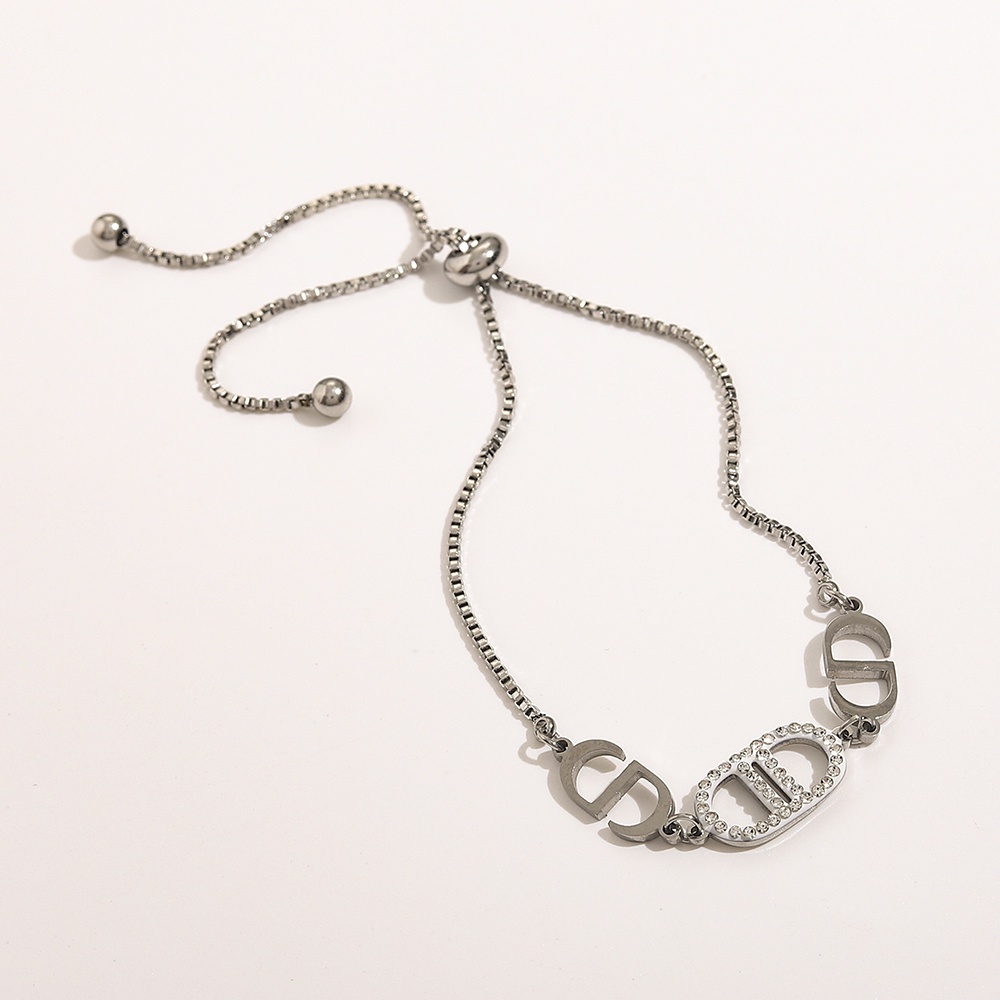 Vòng Tay Dior Bằng Thép Titan Thiết Kế Đục Lỗ Thời Trang