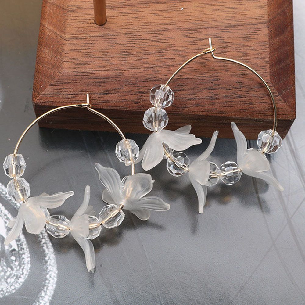 Khuyên tai tròn họa tiết cách điệu