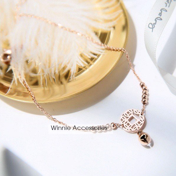 Lắc chân nữ titan đồng xu bi VH