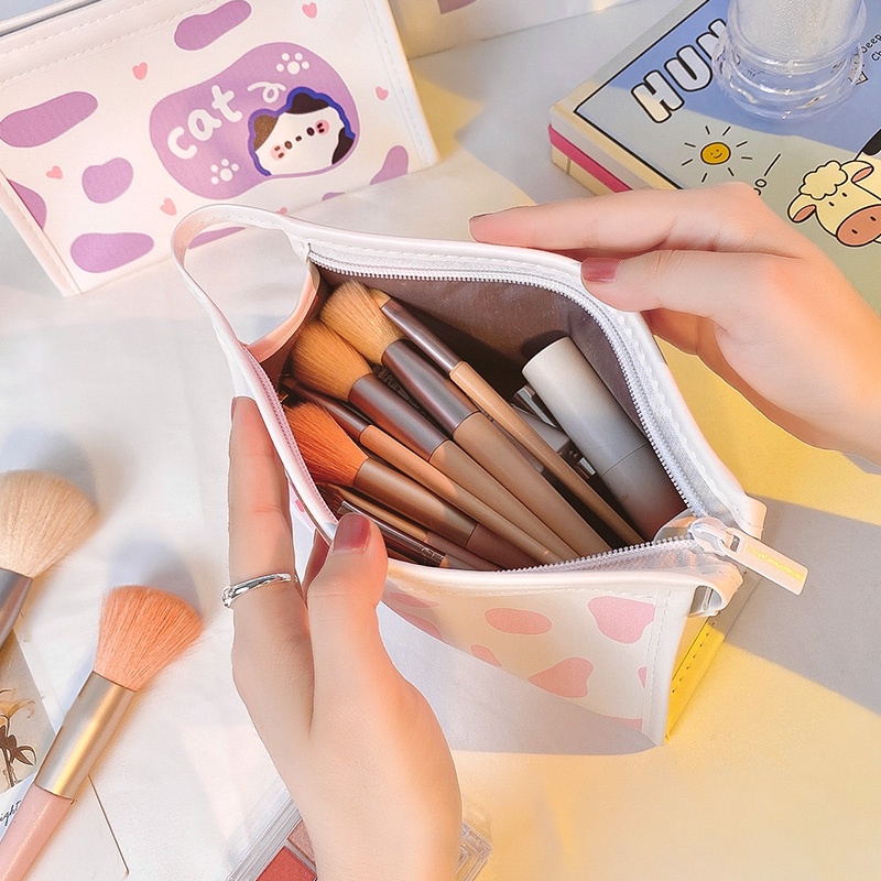 Bóp bút họa tiết con bò hoạt hình dễ thương công suất lớn dùng đựng bút mĩ phẩm tiện lợi