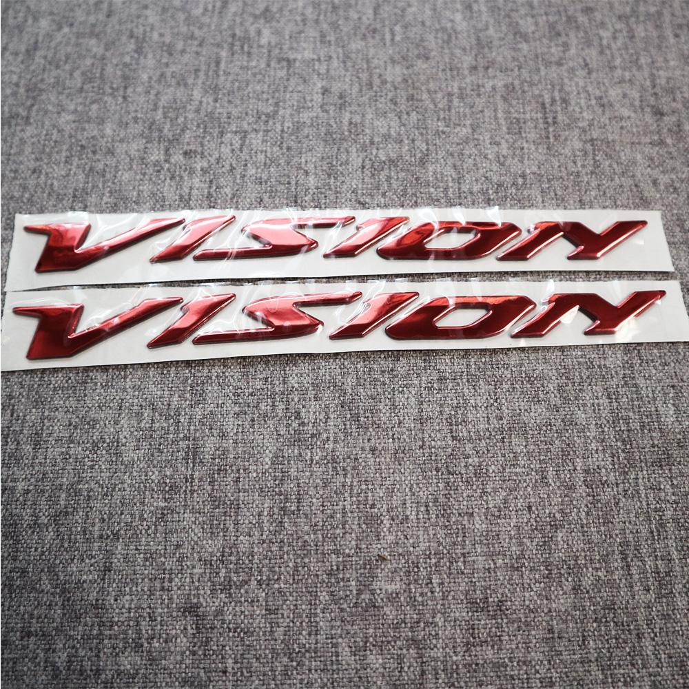 Tem logo chữ nổi xe máy Vision chất liệu nhựa dẻo si bóng màu: đỏ, vàng, bạc- Hàng Cty