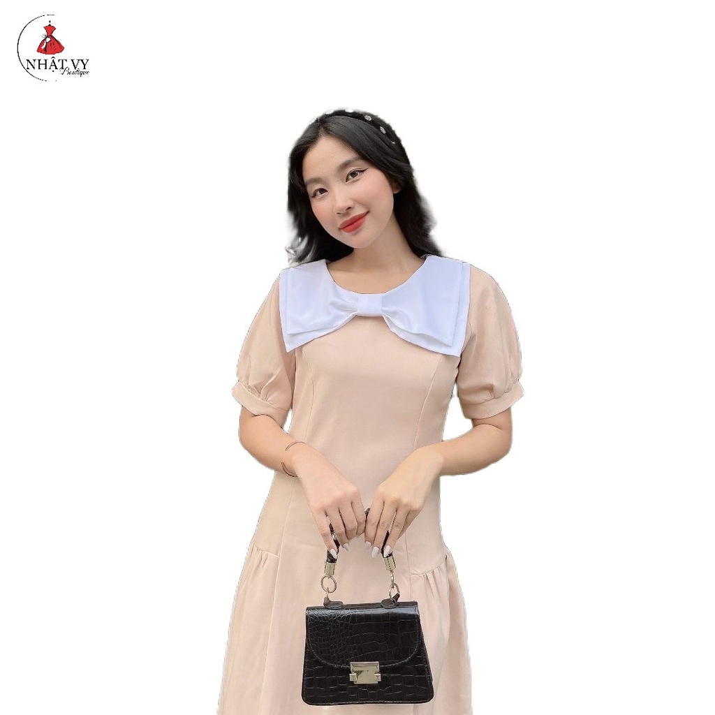 Đầm Nữ NHẬT VY Chiết Eo Cổ Phối Nơ Trắng Tay Phồng Chất Kaki Thun Công Sở Dáng Xòe Màu Đen, Cam Đất, Nude - D2073