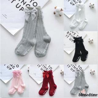 Tất dài đầu gối đính nơ đáng yêu cho bé gái