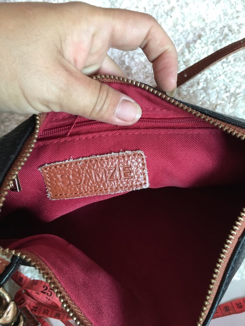 Túi đi da thật hiệu y hình đeo chéo