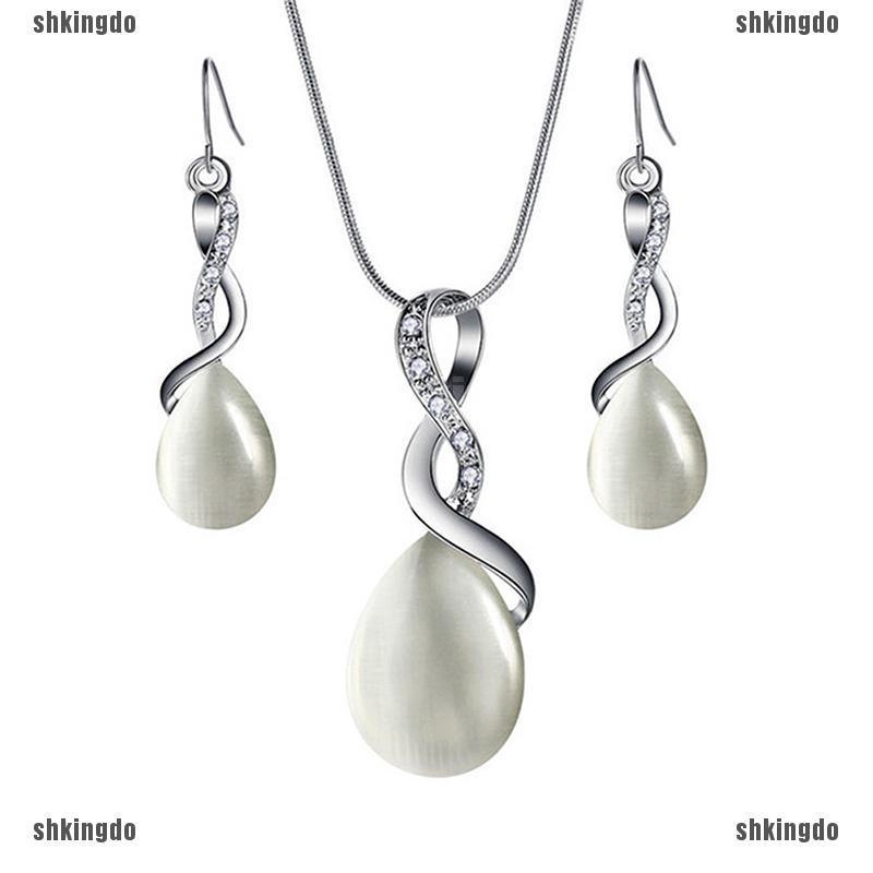 Bộ dây chuyền và bông tai đính ngọc mắt mèo