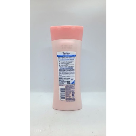 Sữa dưỡng thể làm trắng da Vaseline Healthy White Instant Fair chai 200ml