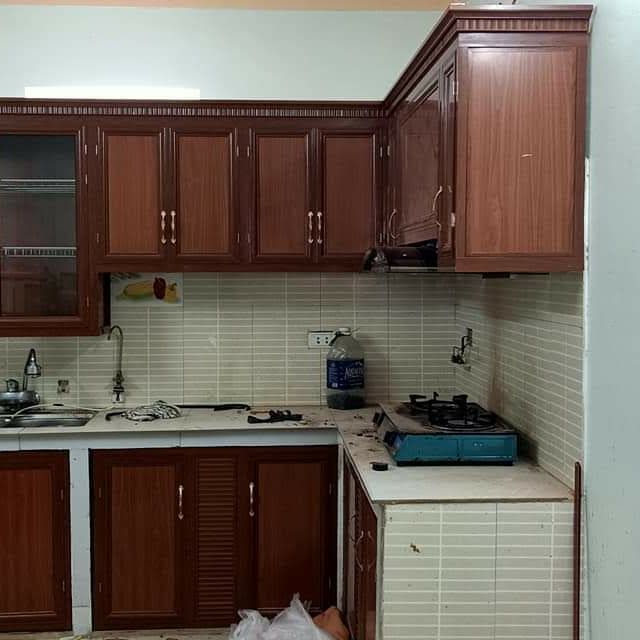 Làm tủ bếp nhôm kính