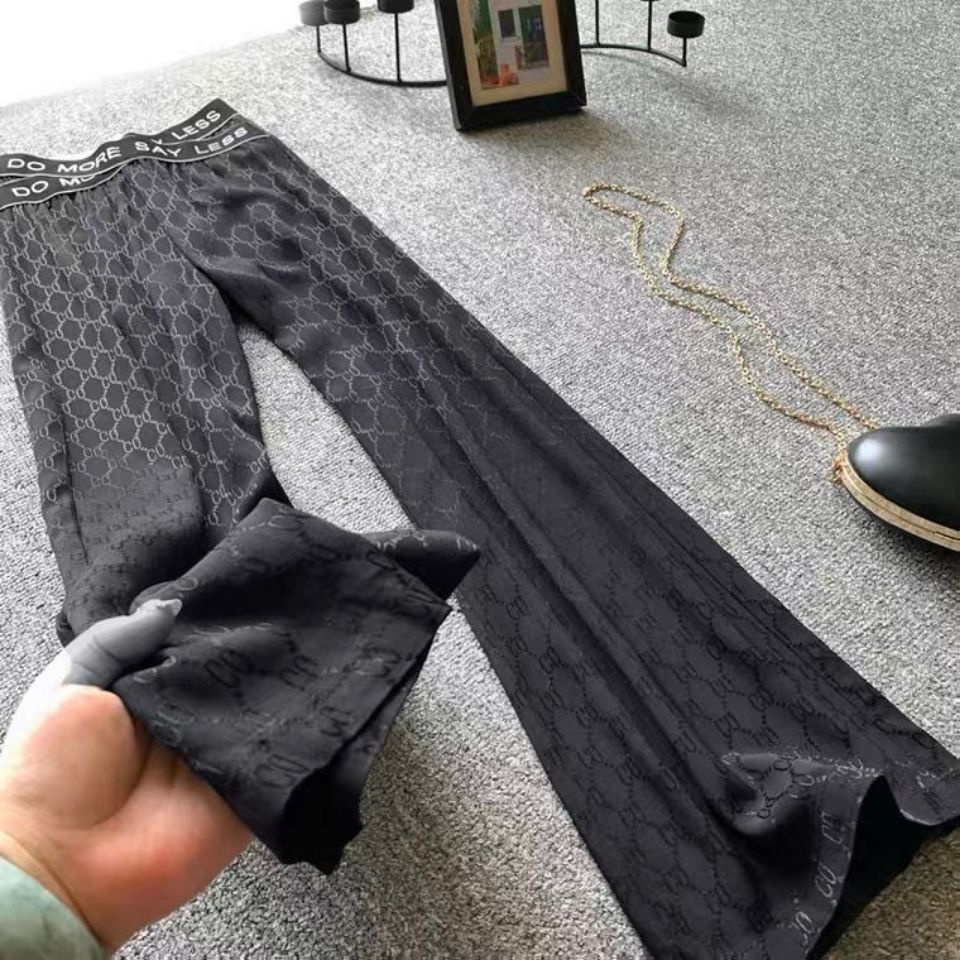 Quần dài màu đen ống rộng lưng cao tôn dáng hợp thời trang dành cho nữ