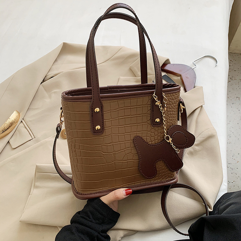 Túi xách thiết kế giản dị thời trang sành điệu cho nữ