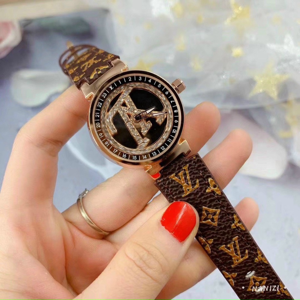Đồng hồ nữ LV siêu phẩm mặt xoay dây da cực xịn có hoa văn