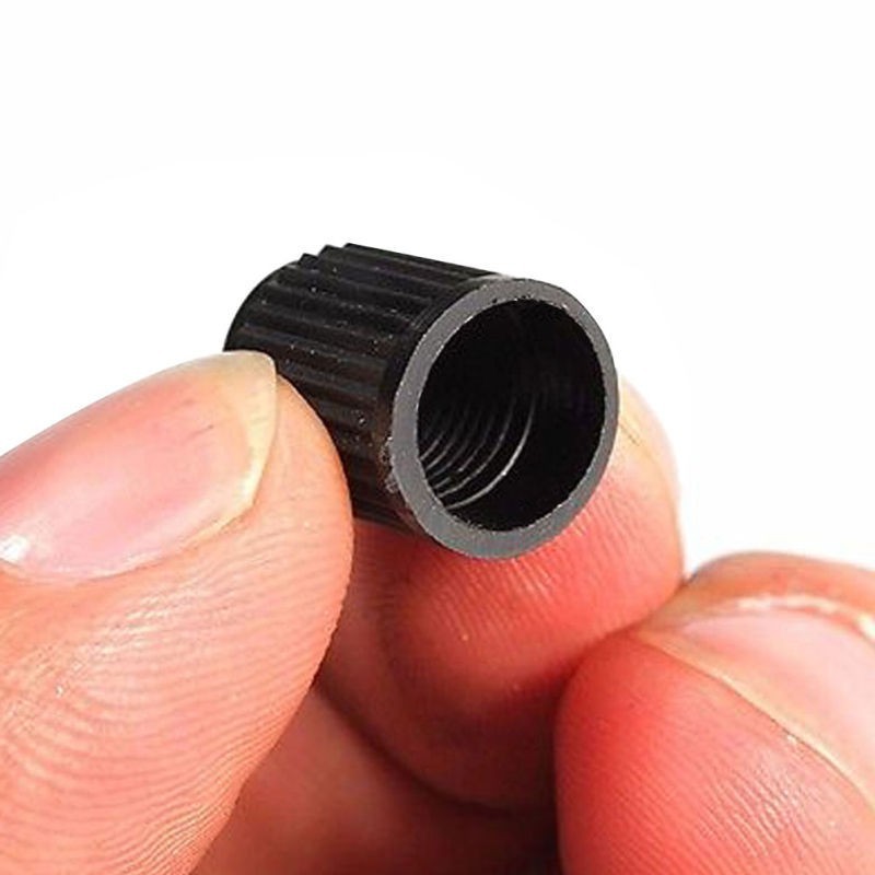 Bộ 100 nắp nhựa đen gắn van bánh xe hơi