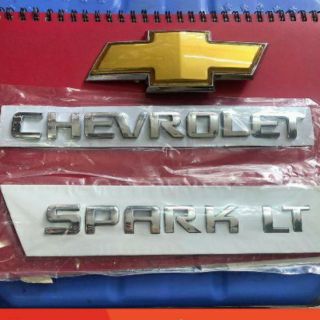 Logo kim loại theo xe Chevrolet Spark LT